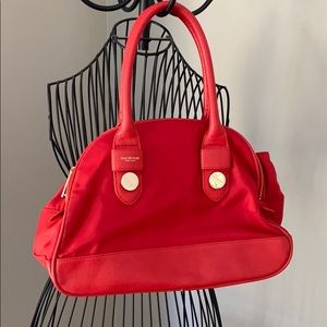 Isaac Mizrahi red purse.